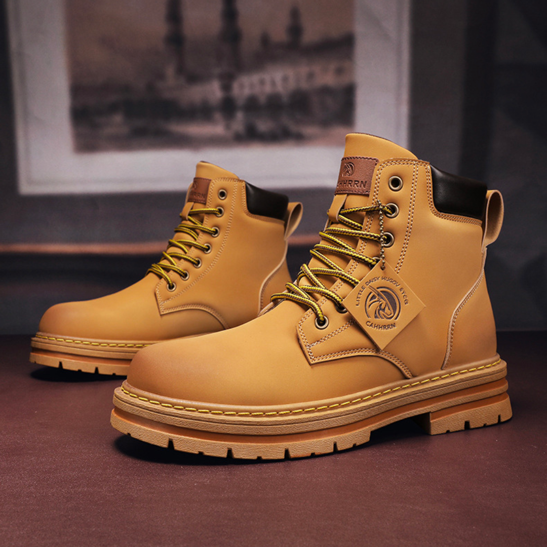 Men's waterproof leather hiking combat boots by LAKD with rugged sole, designed for outdoor trekking and rugged terrain.