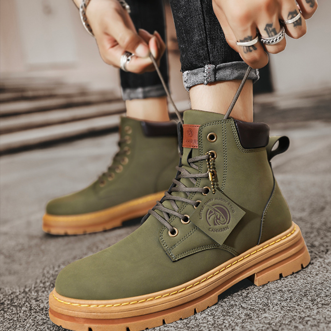 Men's waterproof leather hiking combat boots by LAKD with rugged soles, showing sturdy design and durable construction.