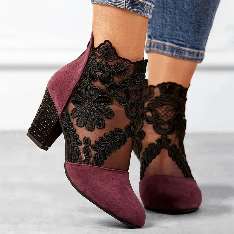 Women's floral lace ankle boots with block heels by LAKD, showcasing elegant design and intricate lace details.