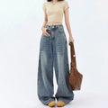 Jean taille haute jambes larges coupe ample en denim pour femme