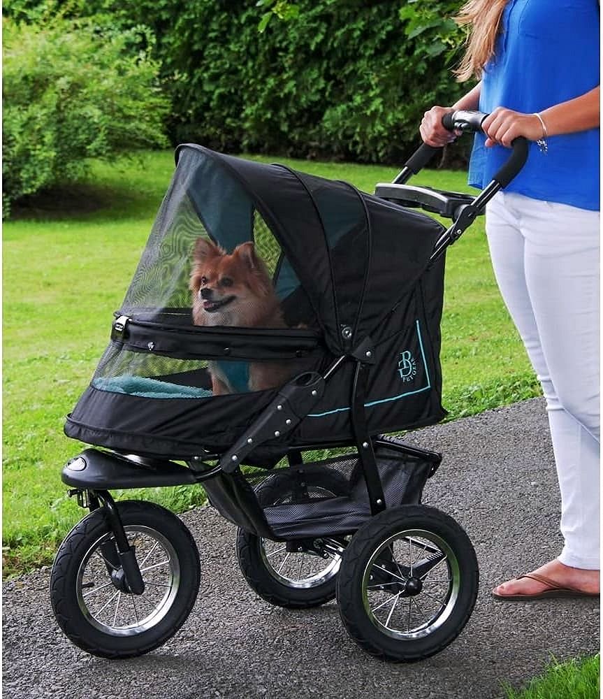 2026 Poussette pour animaux No-Zip NV pour chats et chiens Entrée sans fermeture éclair · Pliage à une main · Roues remplies de gel · Coussin en peluche & protection contre les intempéries inclus · 3 coloris