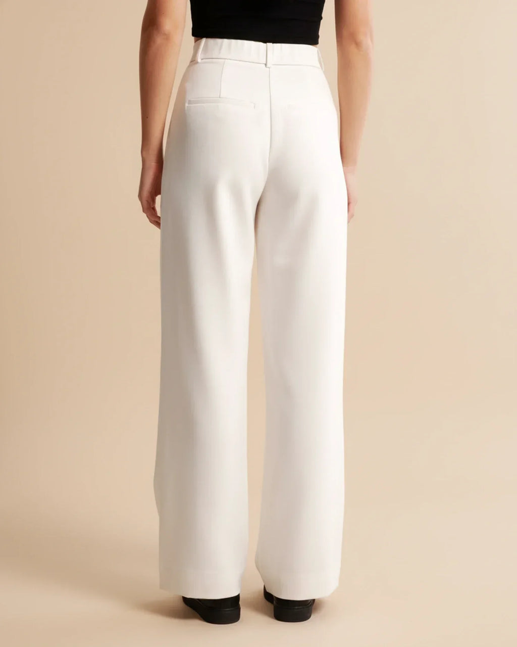 Pantalon taille haute plissé jambes larges tailleur coupe pour femme