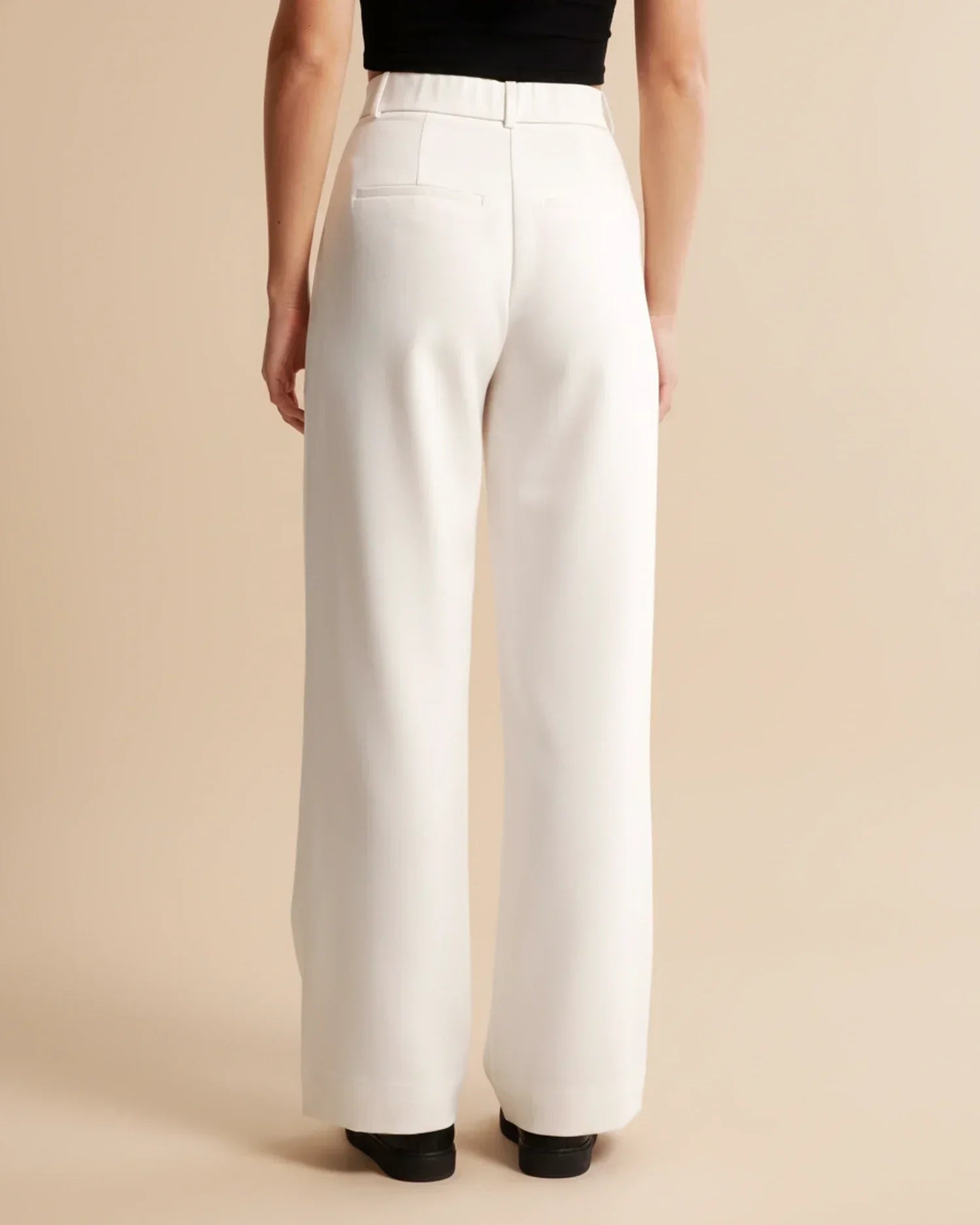 Pantalon taille haute plissé jambes larges tailleur coupe pour femme